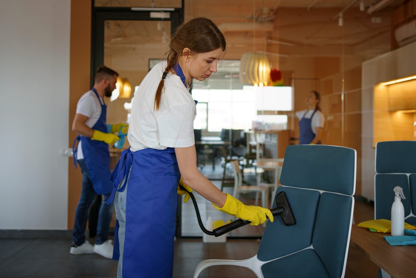 Commercial cleaners cleaning office furniture and workspace in Birmingham