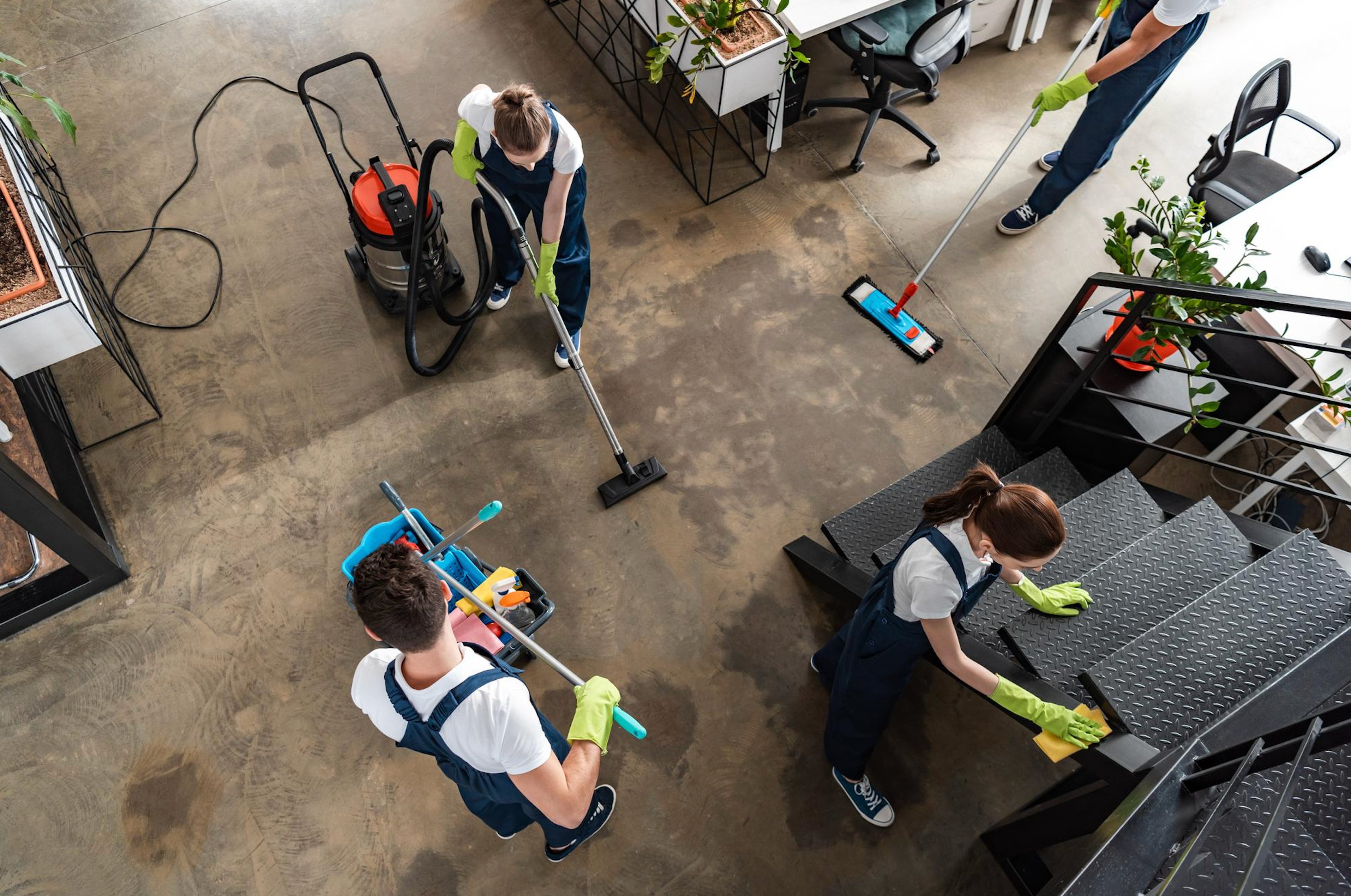 Overhead view of commercial cleaning team working in Birmingham office