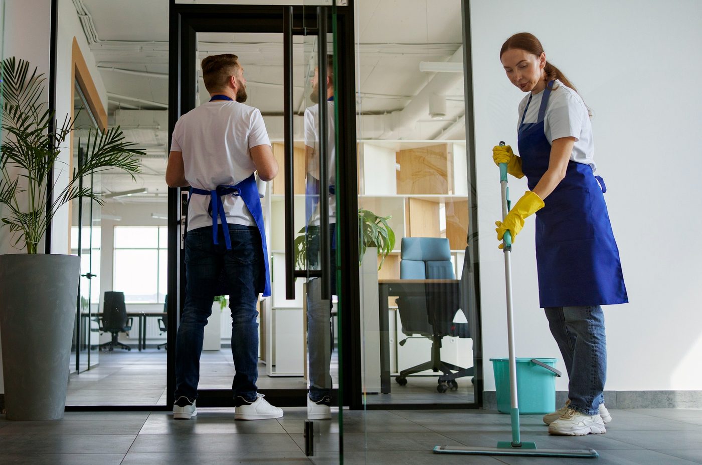Professional cleaners mopping and cleaning an education facility in Birmingham